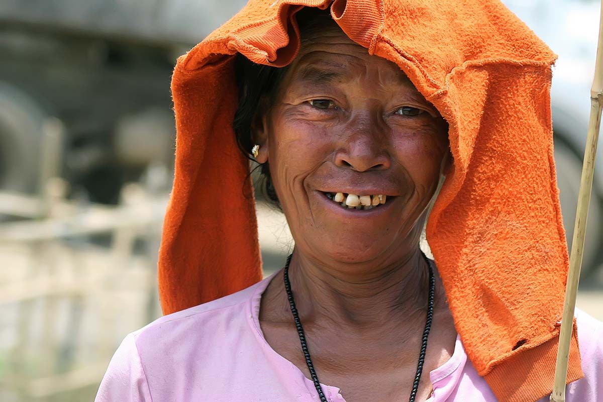 woman-portrait-imphal-lake-loktak-india-fishing