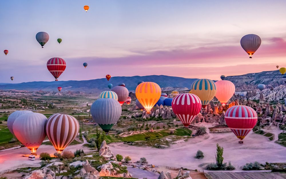 Balloons in the sky of Cappadocia at dawn